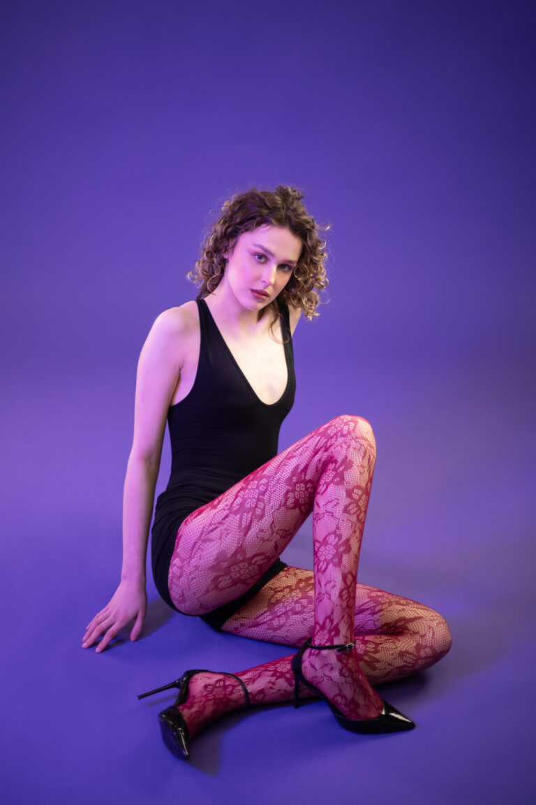 Model on a purple background