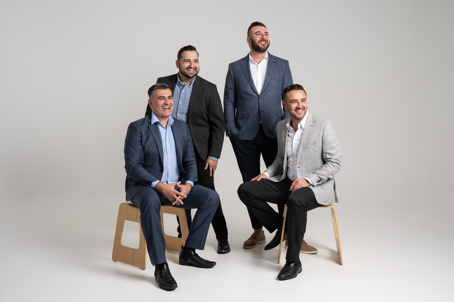 Axia Finance corporate group photo in the studio